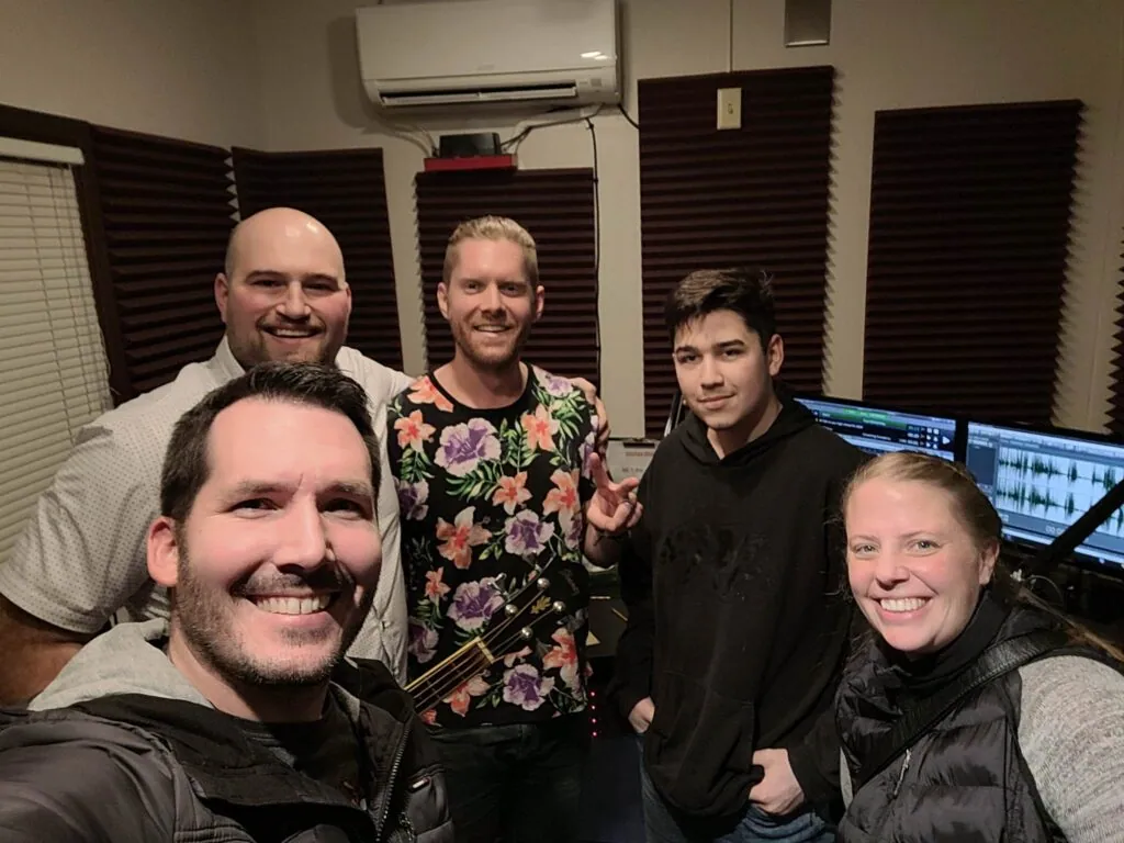 The four of us squeezed in for a selfie with the student host in the studio at 88.1 The Edge.