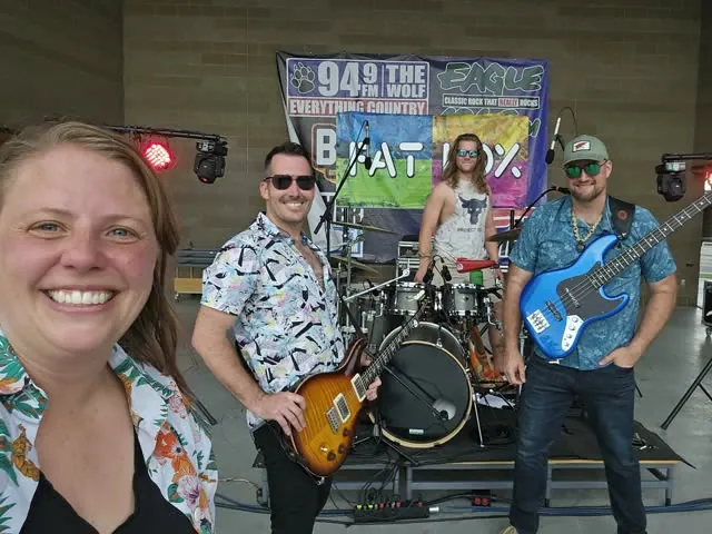 Kali snaps a selfie on stage with Tommy, Rory on drums and Brian, under the Fat Fox banner