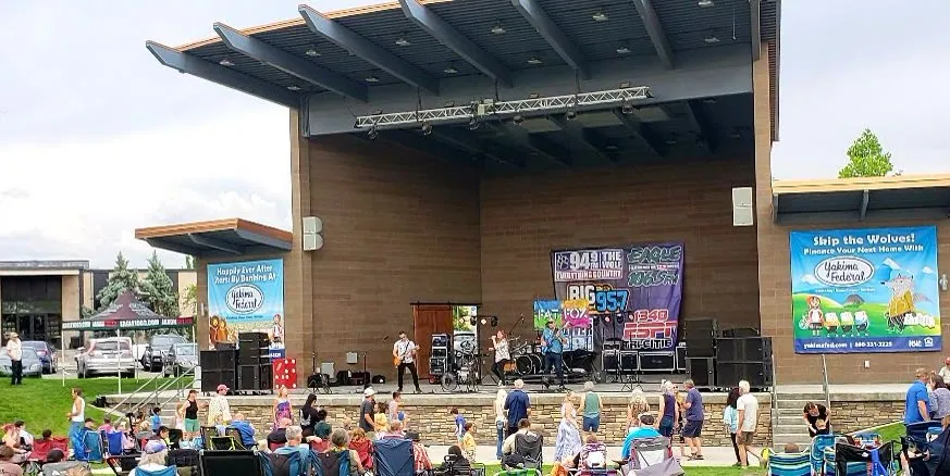 Fat Fox on the big covered outdoor stage at Live @ 5, our 100th show, with folks in lawn chairs and dancing out front